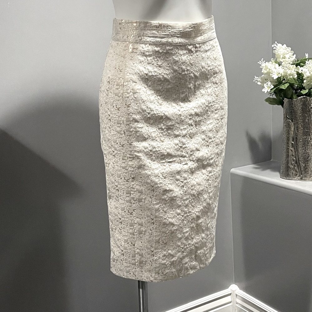 Beautiful cream pencil skirt with gold detailing.